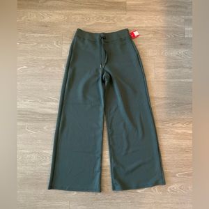 Green Spanx air essential pants